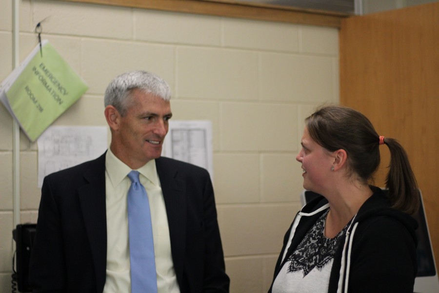 Dr. Lovell visits with Ms. Vraney, Marquette alumna and BEHS math teacher