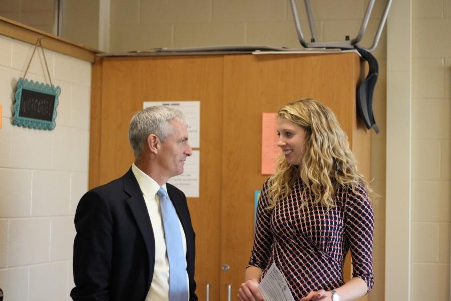 Dr. Lovell visits math teacher and Marquette alumna Ms. Guth during his building tour