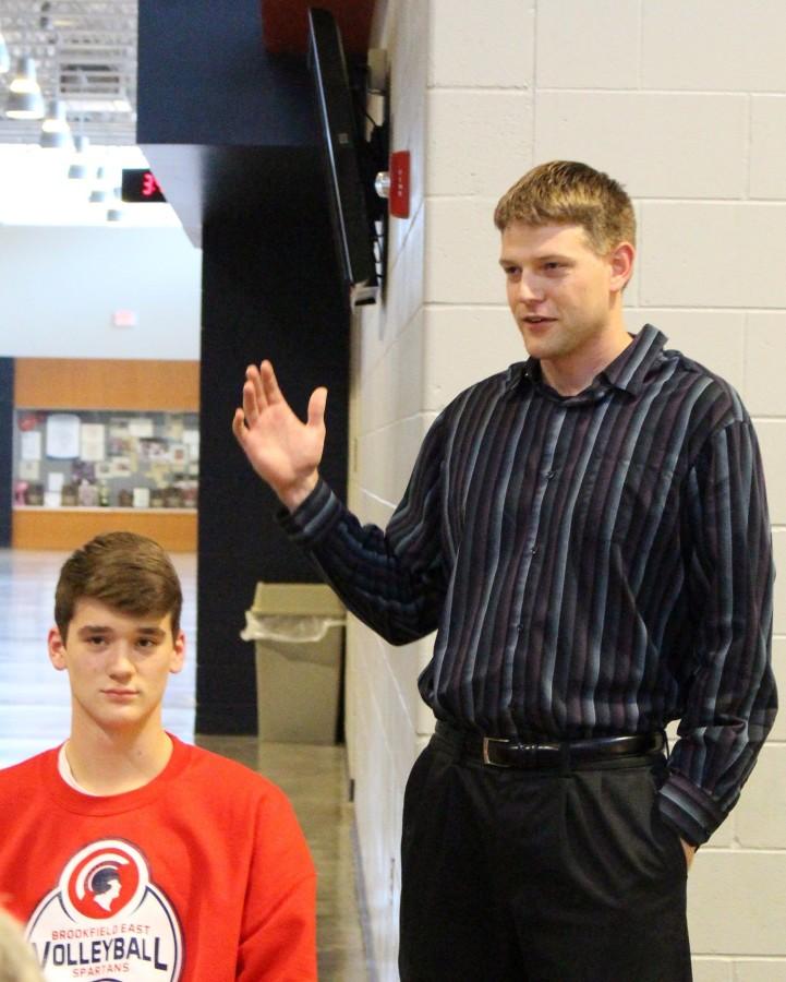 Boys volleyball coach Mr. Owen (right) explains why he believes senior Matt Szews will find success playing at Ball State next year. 