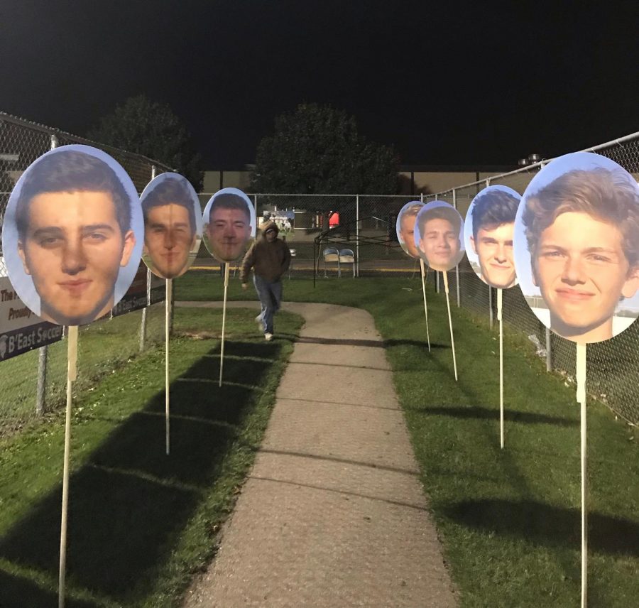 Fans were greeted with cardboard cutouts of their favorite senior players upon entry to the soccer field.