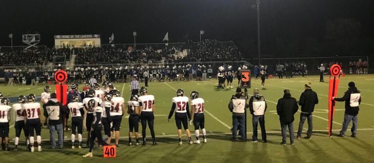 East athletes watch as their team members attempt to break through Centrals impenetrable defense.